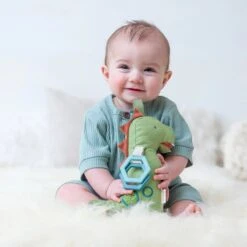 Itzy Ritzy Bespoke Link & Love™ Dinosaur Activity Plush With Teether Toy -Snugpals Store itz avp8085 itzy ritzy bespoke link love dinosaur activity plush with teether toy 178665